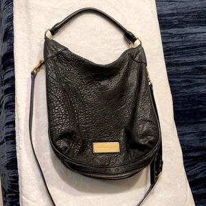 Black Marc Jacob’s shoulder/ cross body bag.